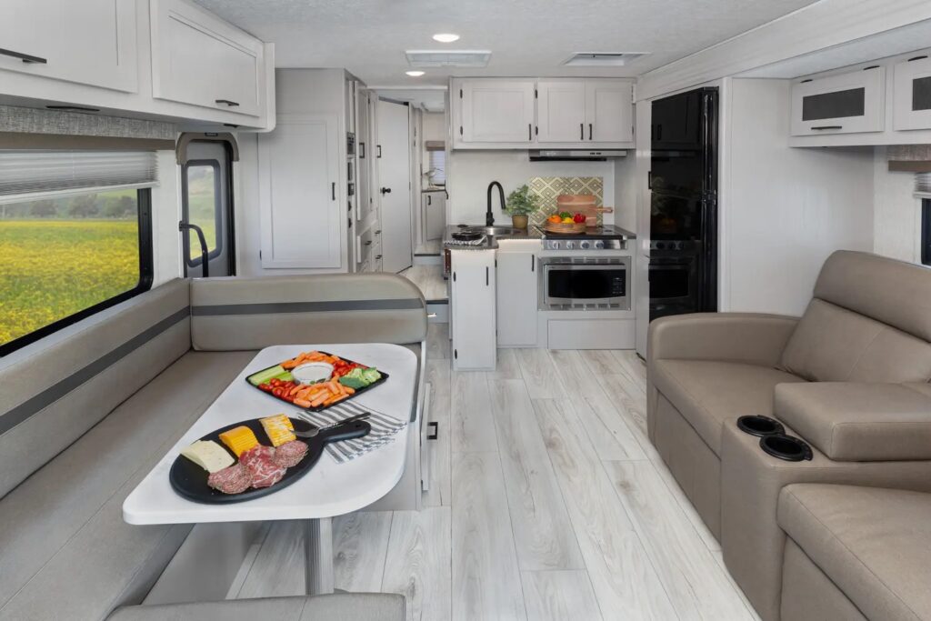 Photo of dining room and kitchen in 2025 Coachman Freelander 26DS